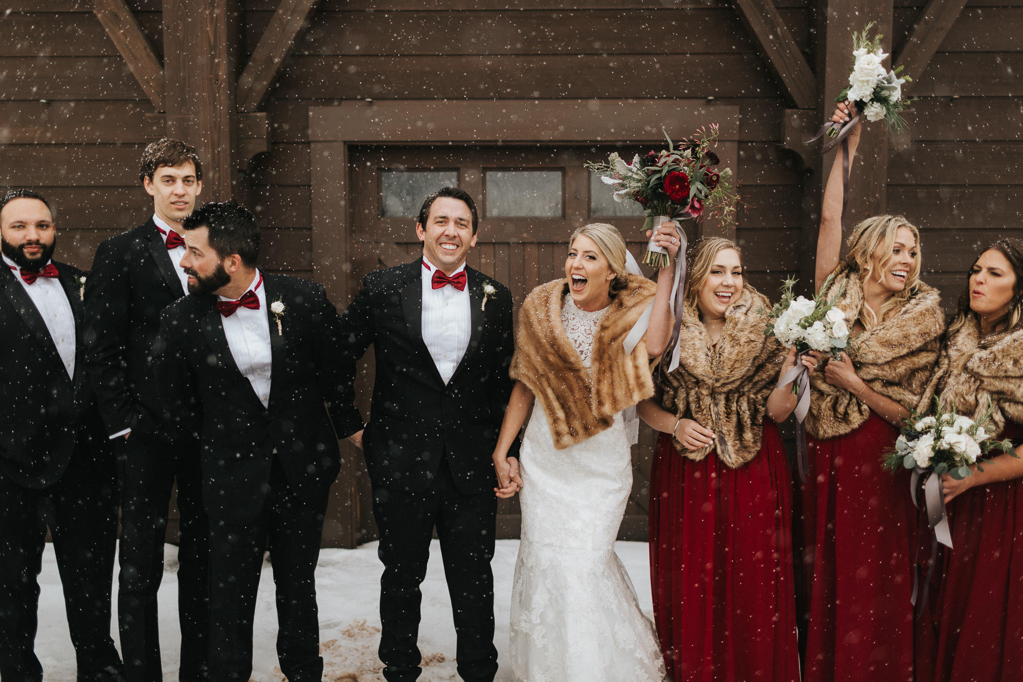 Wedding party cheers at Tetherow Resort in Bend, Oregon