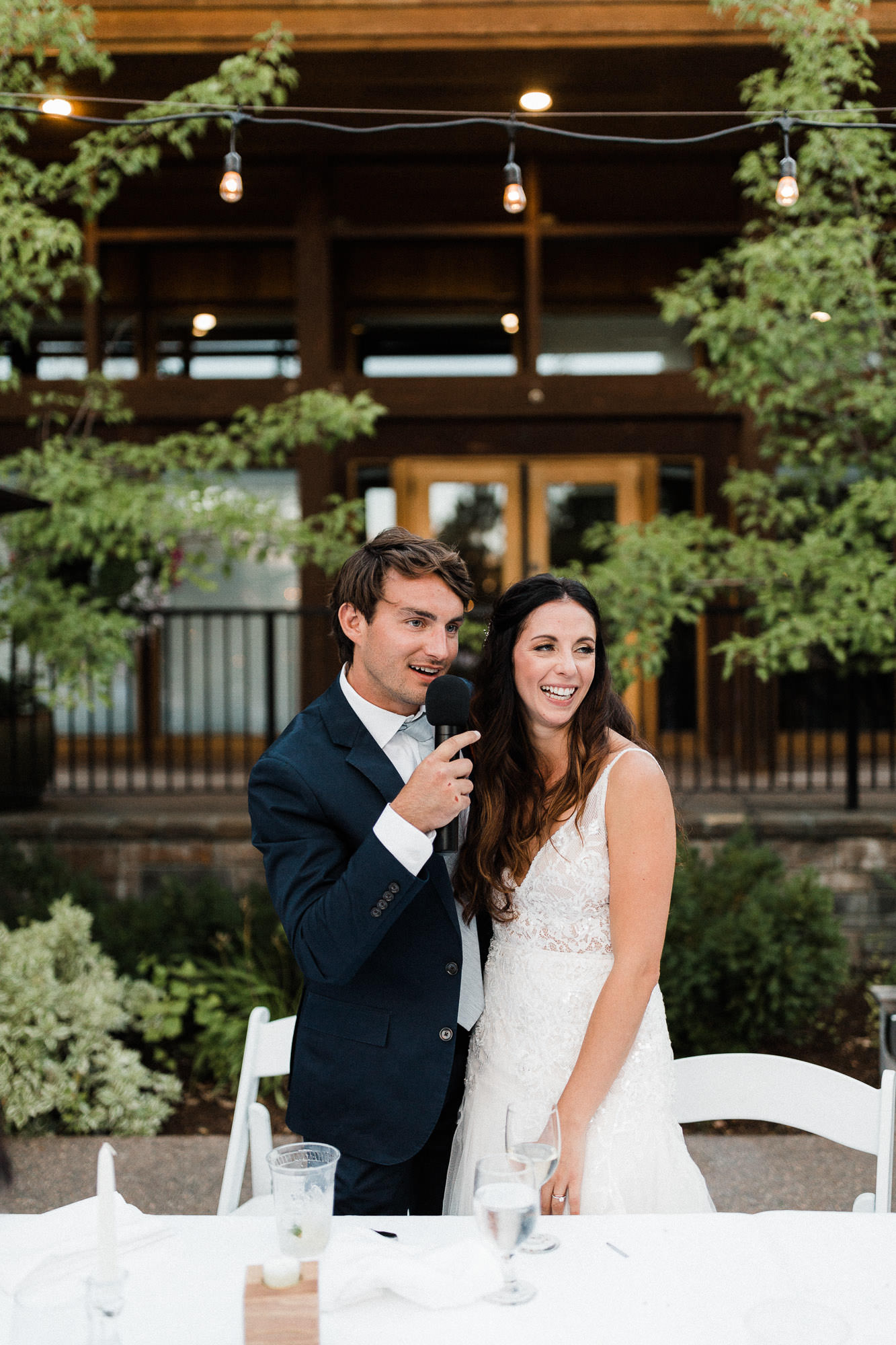 Bride and groom address guests at Broken Top Club in Bend, Oregon