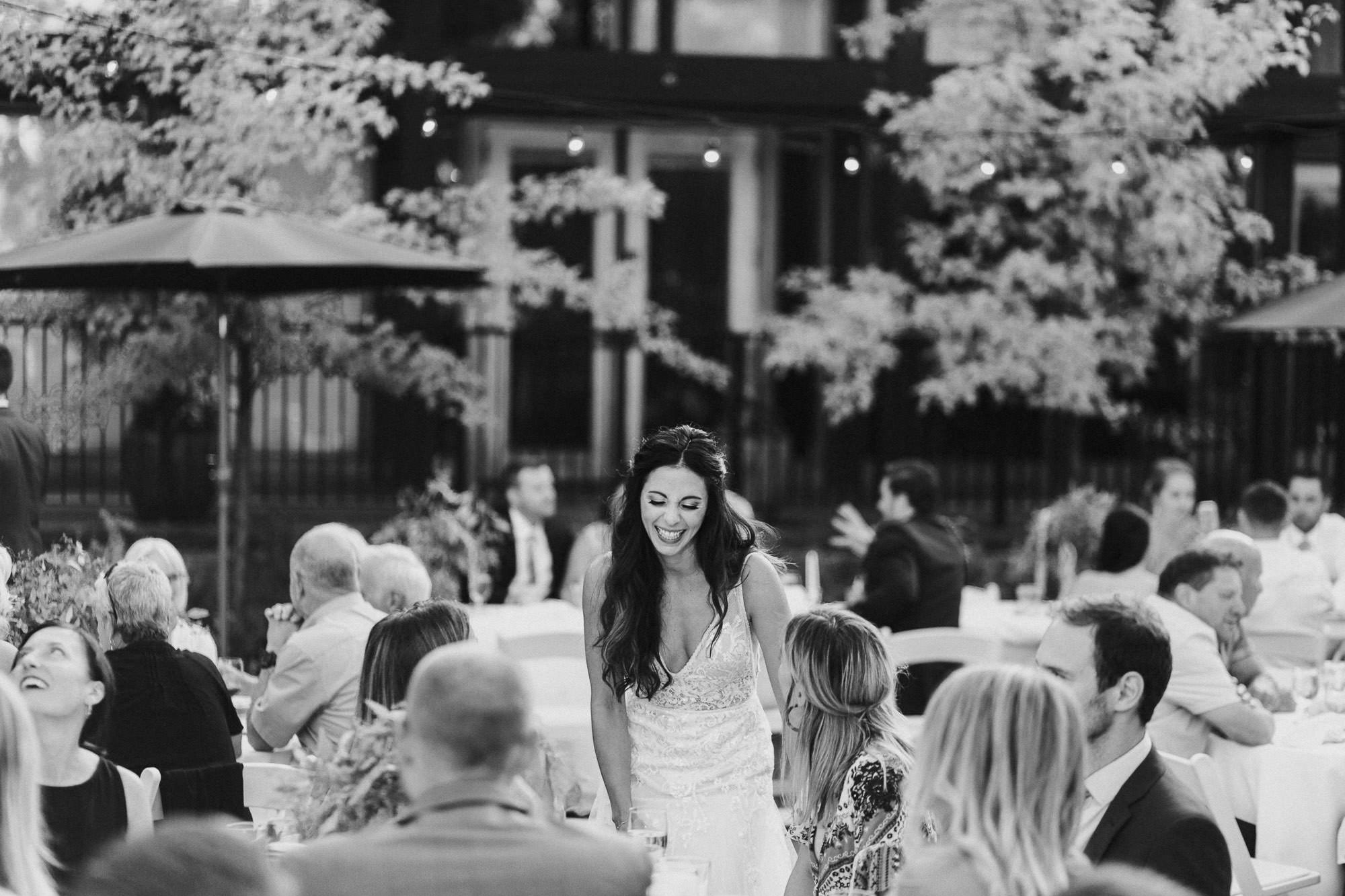 Bride greets guests at Broken Top Club in Bend, Oregon