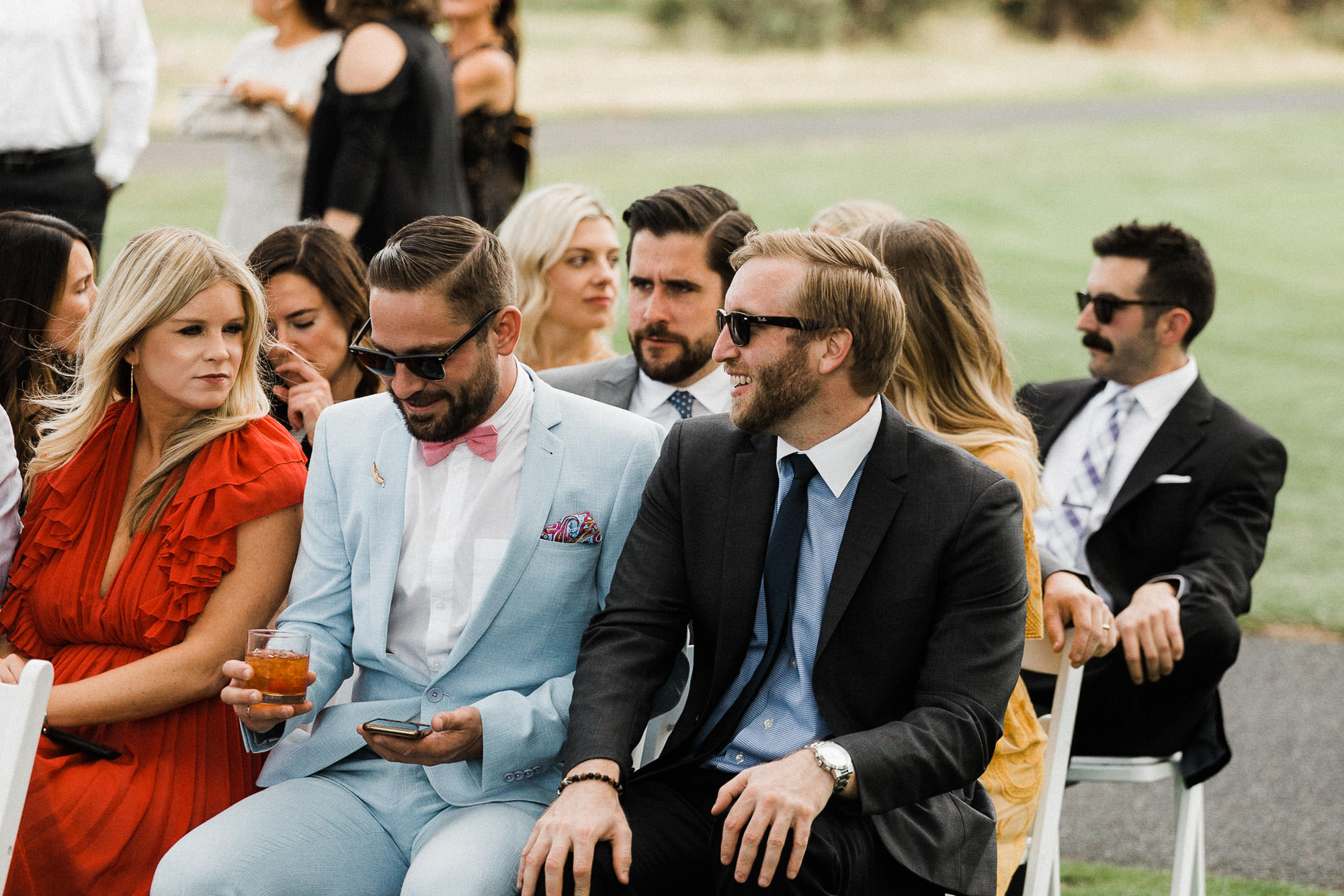 Guests wait for wedding ceremony to start at Broken Top Club in Bend, Oregon