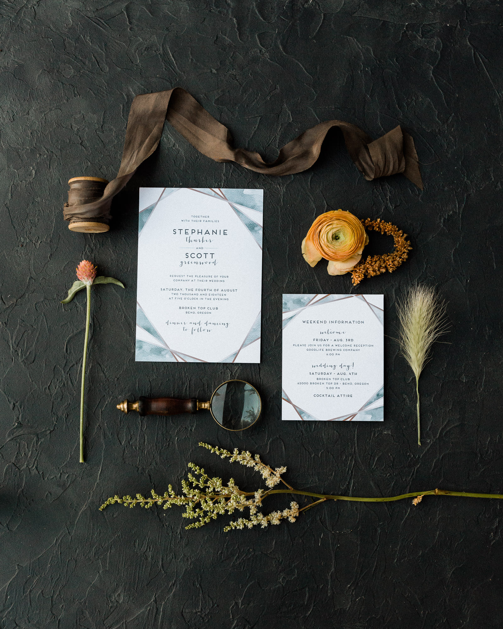 A couple's wedding invitation suite at Broken Top Club in Bend, Oregon