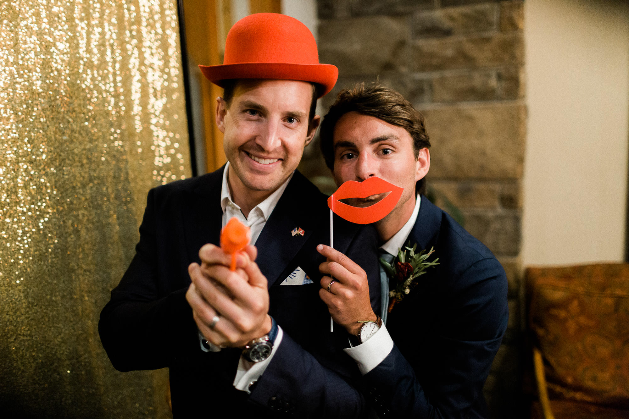 Groom and guest pose with props Guests dance at Broken Top Club wedding in Bend, Oregon