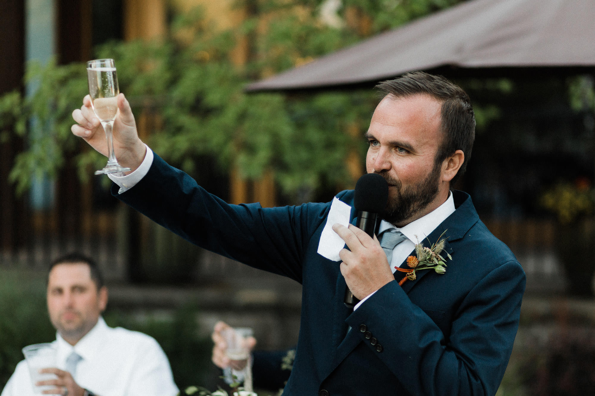 Groomsman makes toast at Broken Top Club in Bend, Oregon