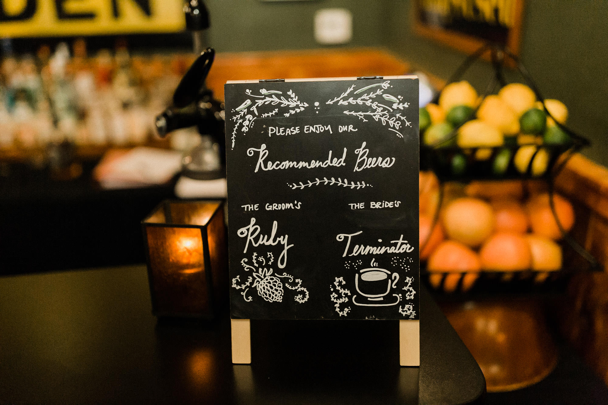 A sign with signature wedding drinks sits on the bar at McMenamin's Old St. Francis School in Bend, Oregon