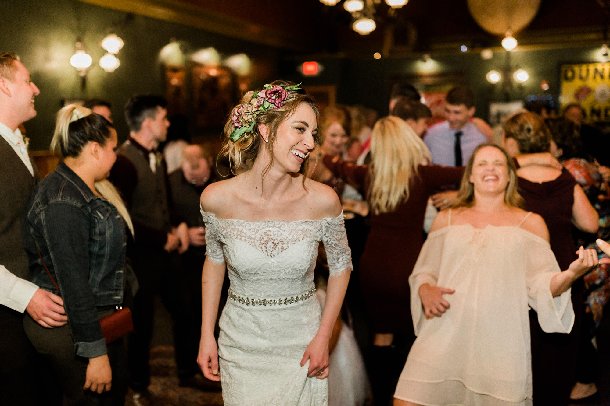 Bride dances at wedding reception at McMenamin's in Bend, Oregon