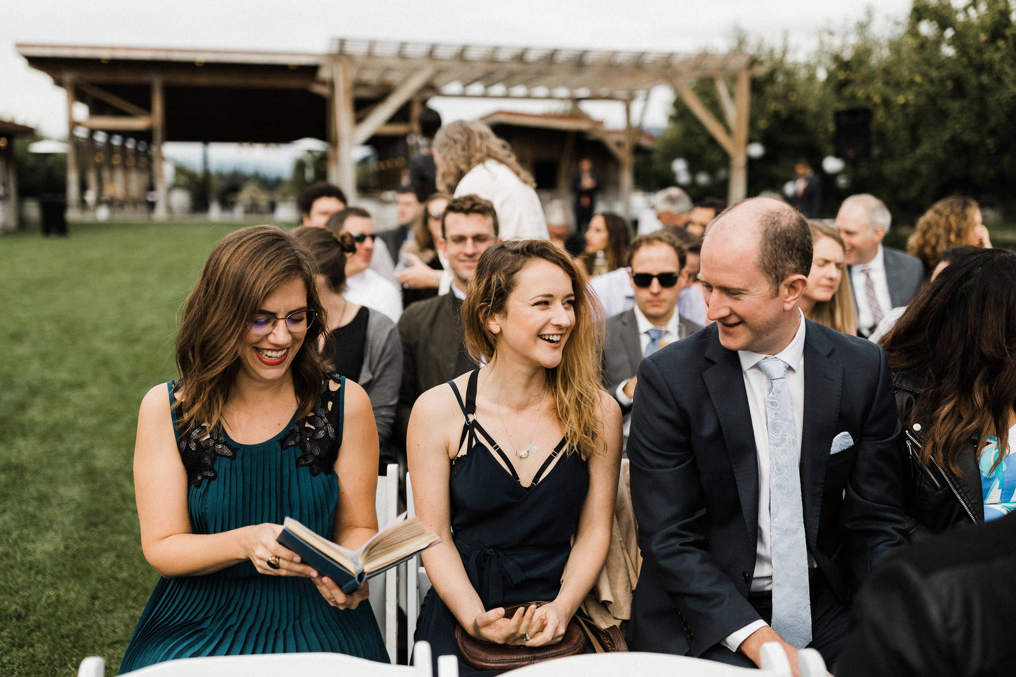 Guests wait for the wedding ceremony to begin at Mt. View Orchards.