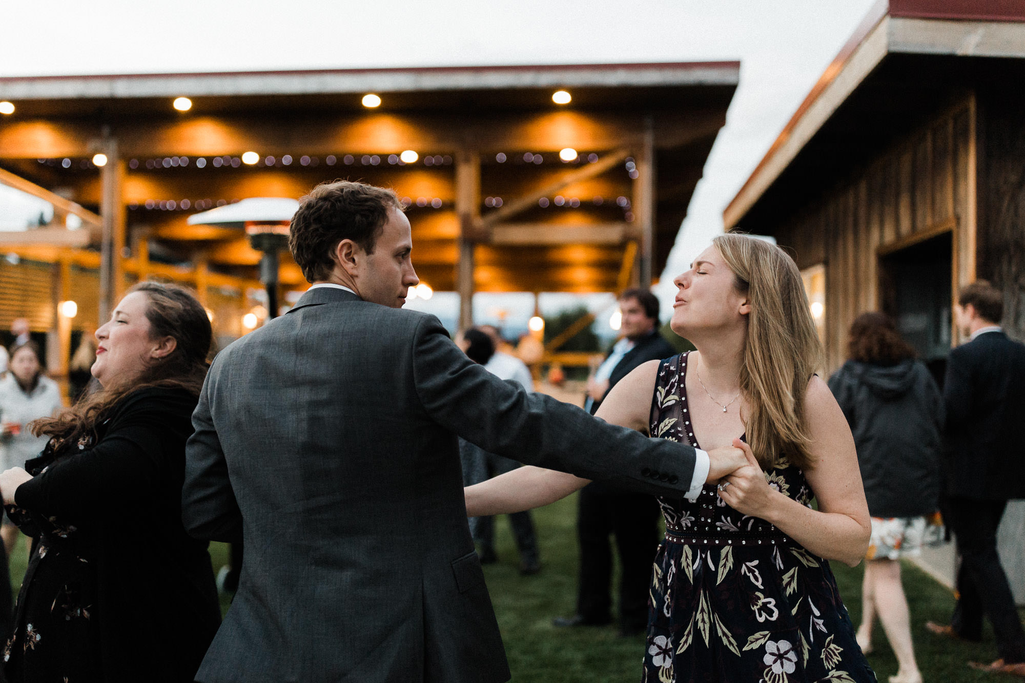 Wedding guests dance at Mt. View Orchards in Mt Hood, Oregon.