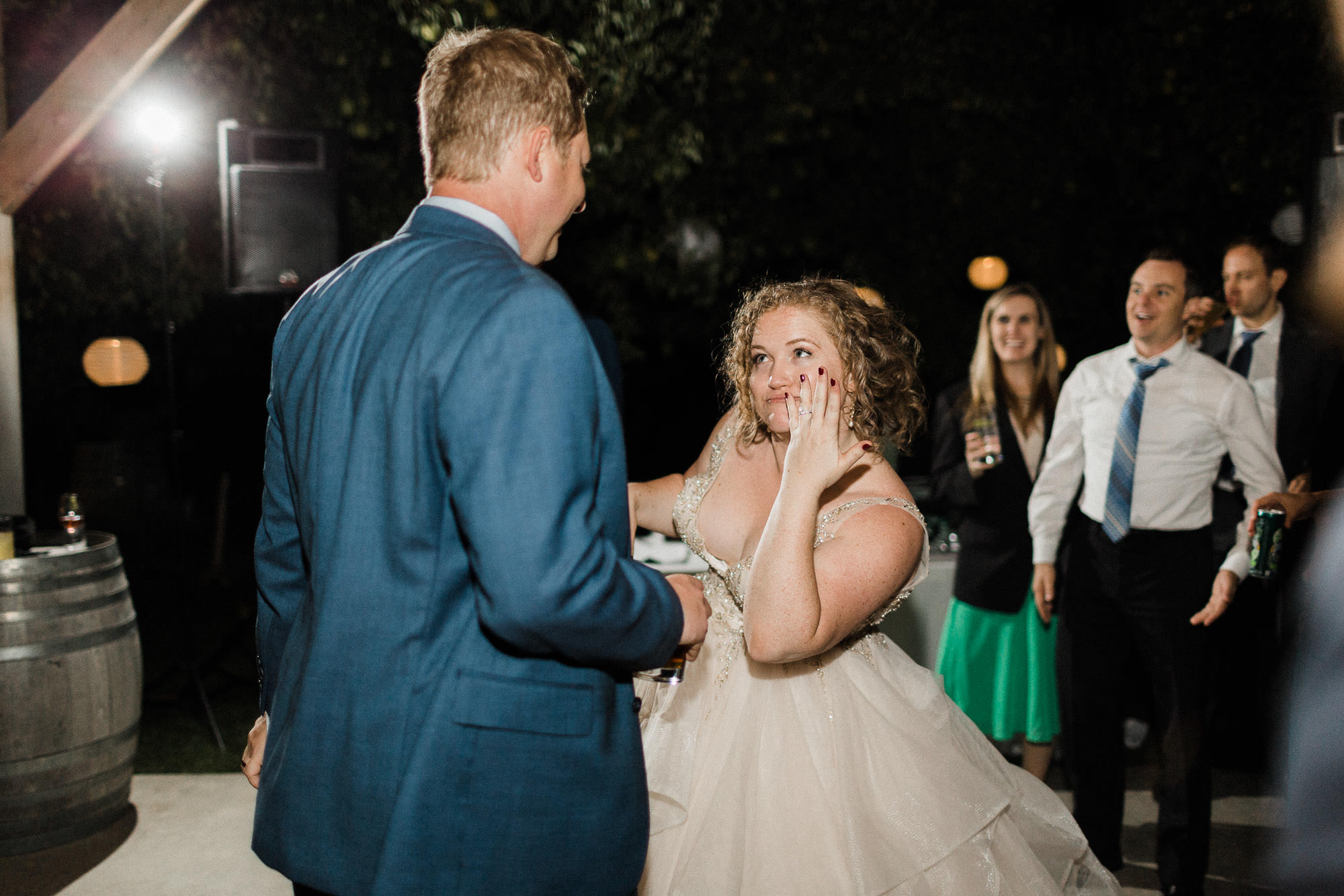The bride and groom dance with guests at Mt. View Orchards in Oregon.