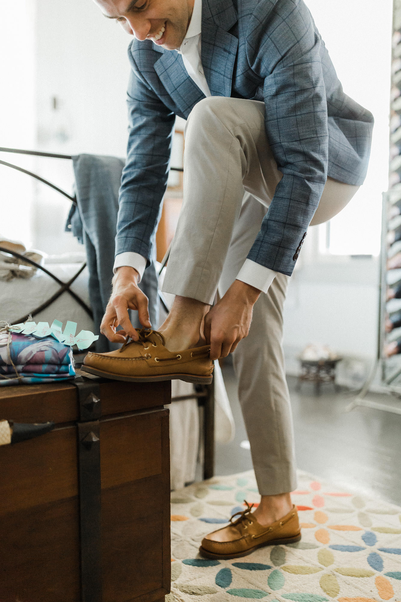 gay-wedding-groom-putting-on-shoe
