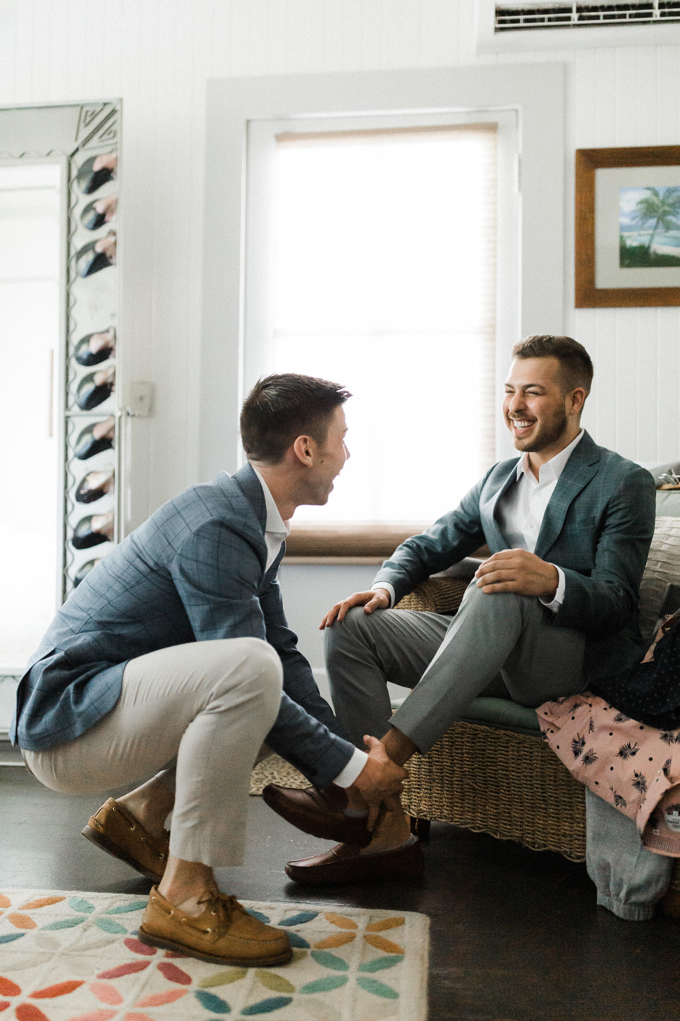 Gay-wedding-putting-shoes-on 