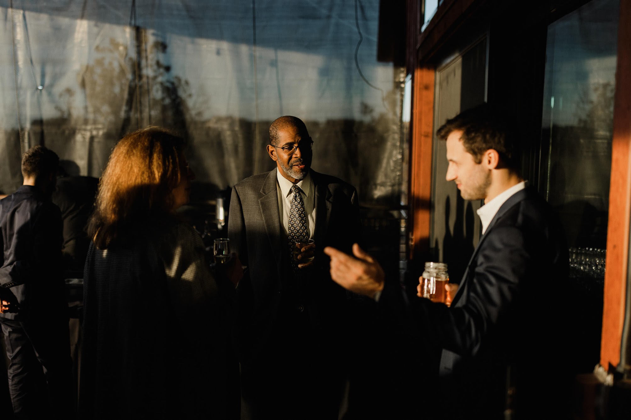 Guests talking with each other during cocktail hour
