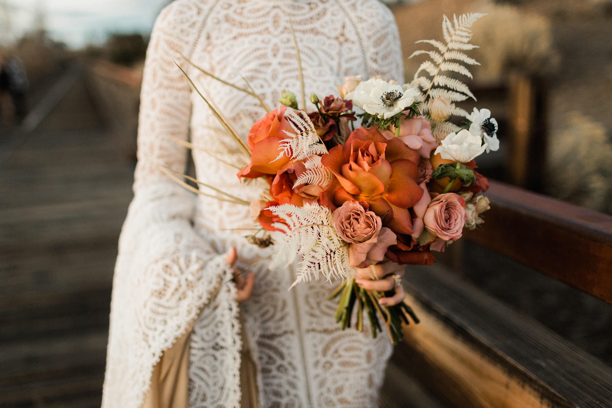 bridal bouquet with fresh florals and dried ferns.