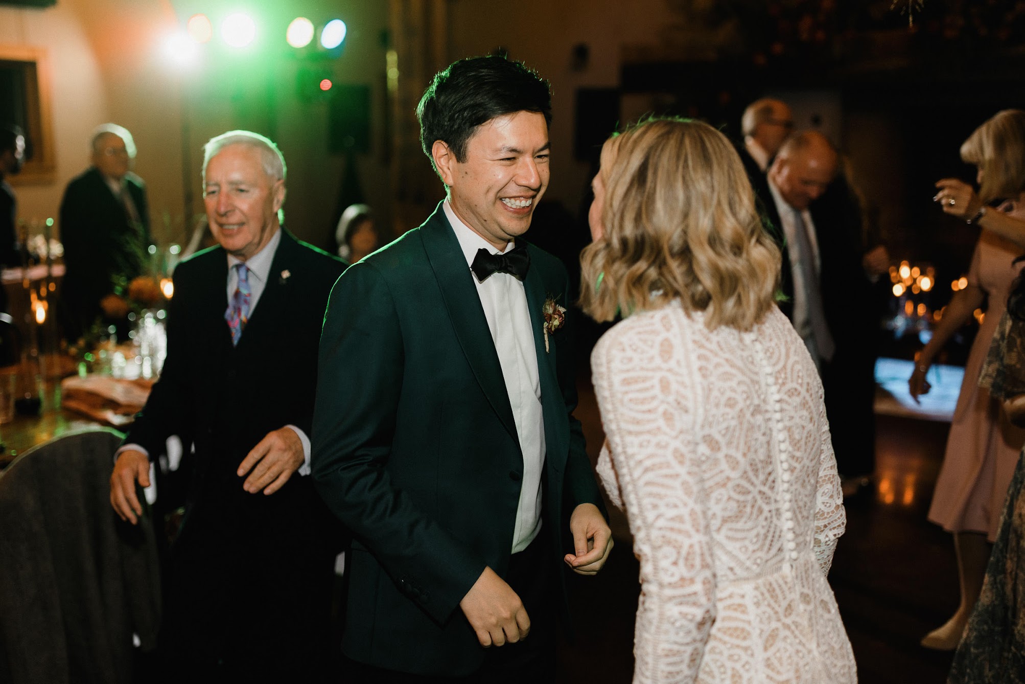 bride and groom on the dance floor having fun