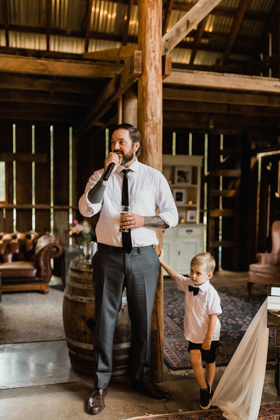 The best man standing up giving a speech 