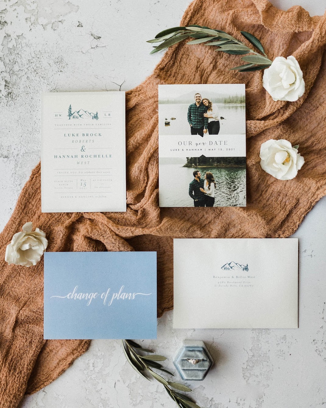 Wedding invitations suites, along with Save-the-dates, and the wedding rings. 