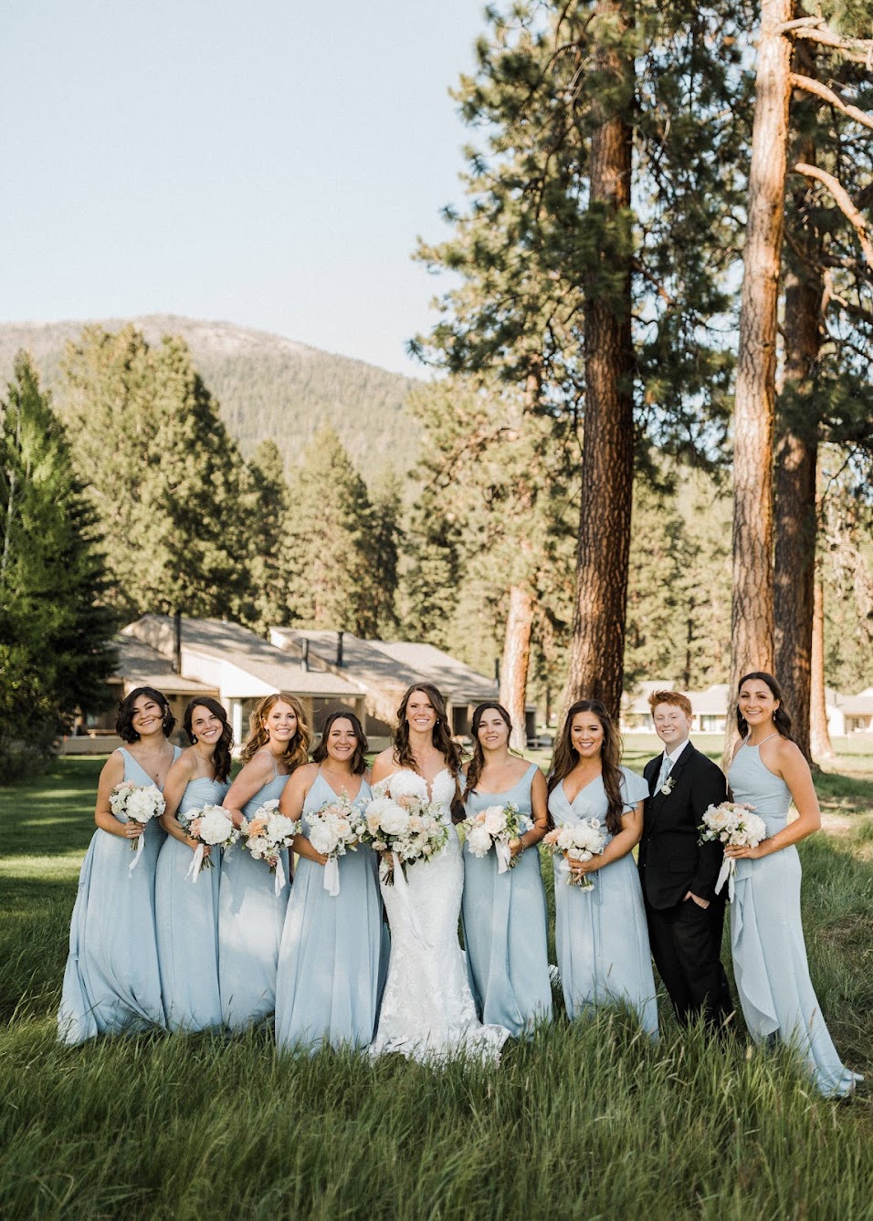 bride and bridesmaids in tall grass 