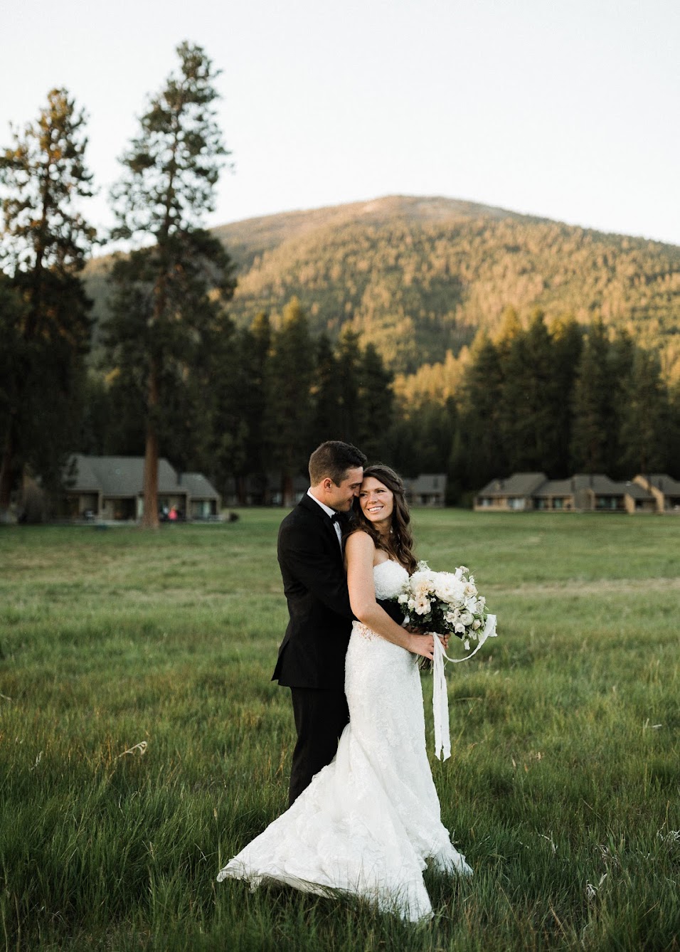 Bride and groom portrait , the groom holding the bride 