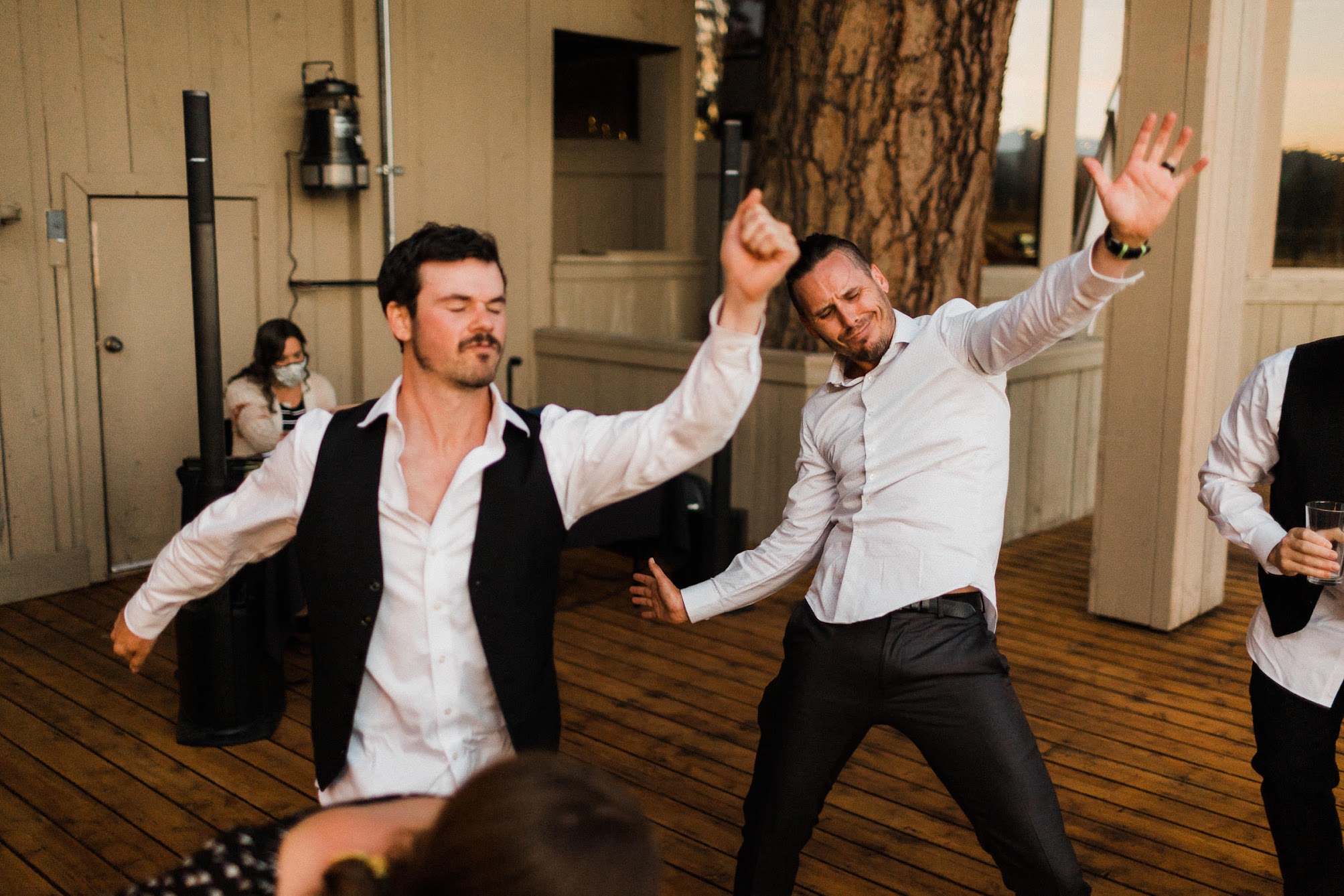 groomsmen doing an air guitar 