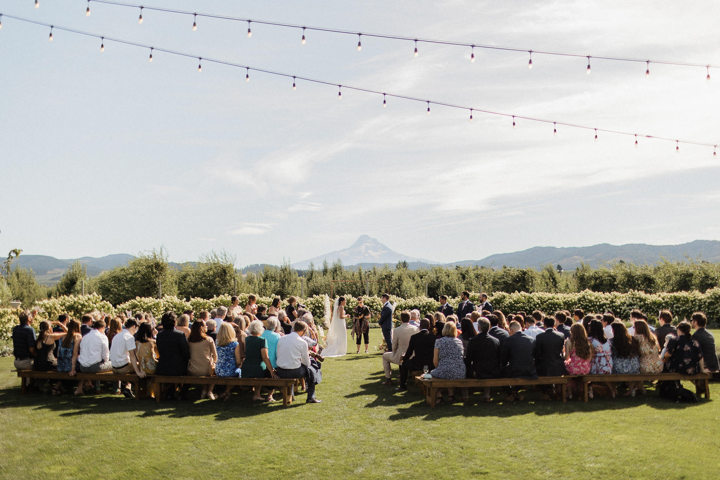 A wedding ceremony with a view of Mount Hood at The Orchard