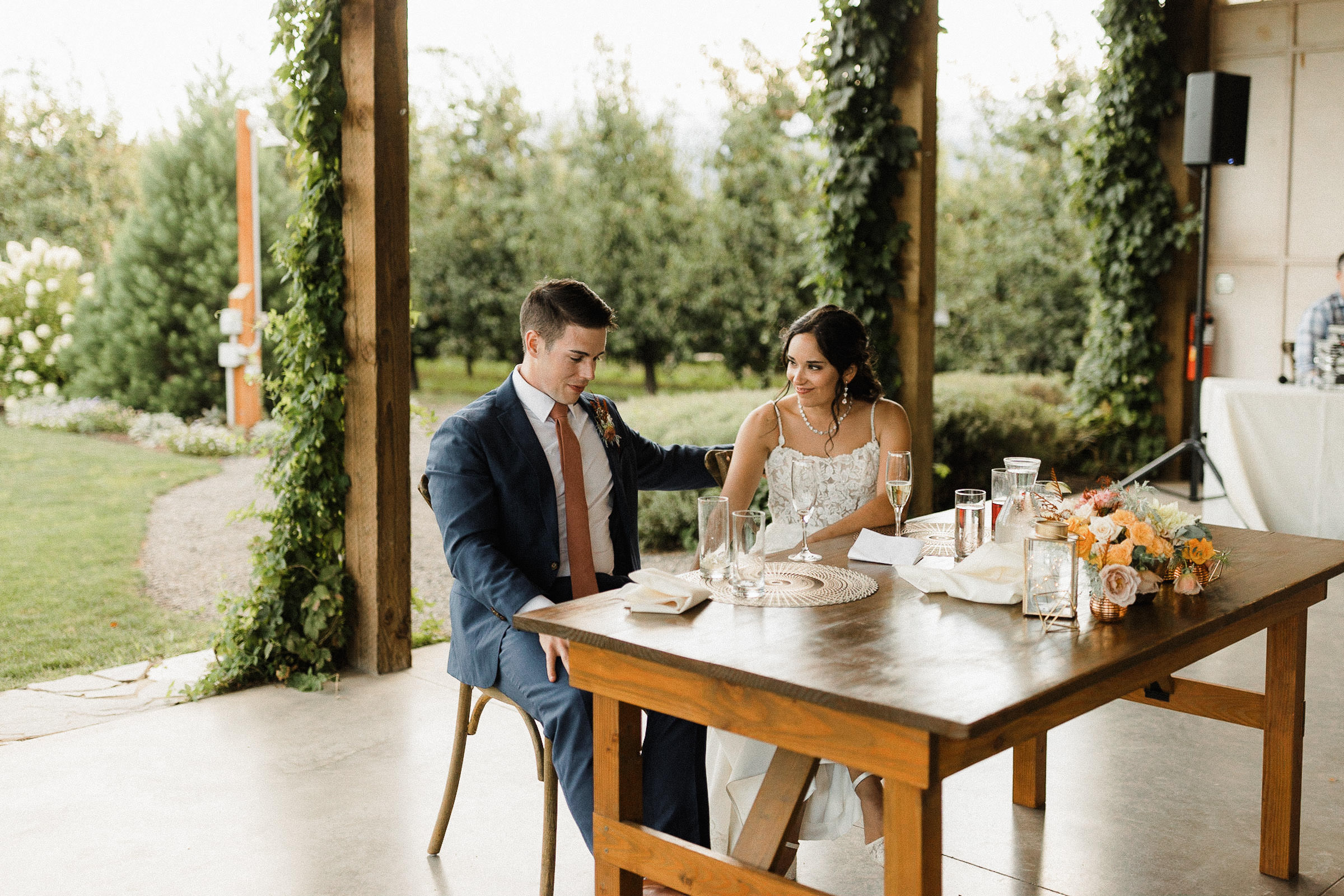 Groom and bride react emotionally to a toast