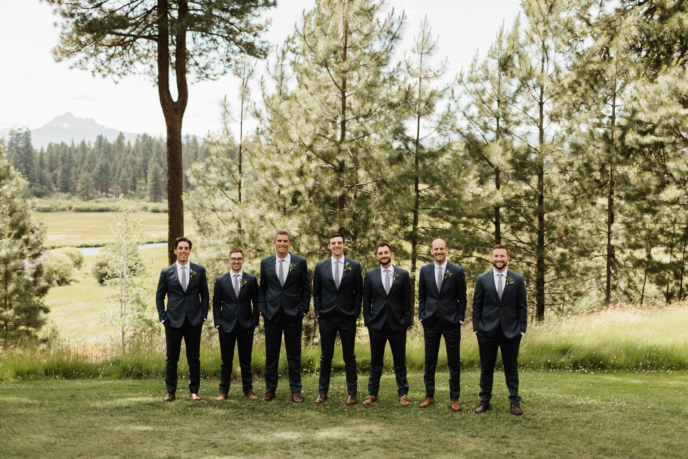 Groomsmen pose for a portrait