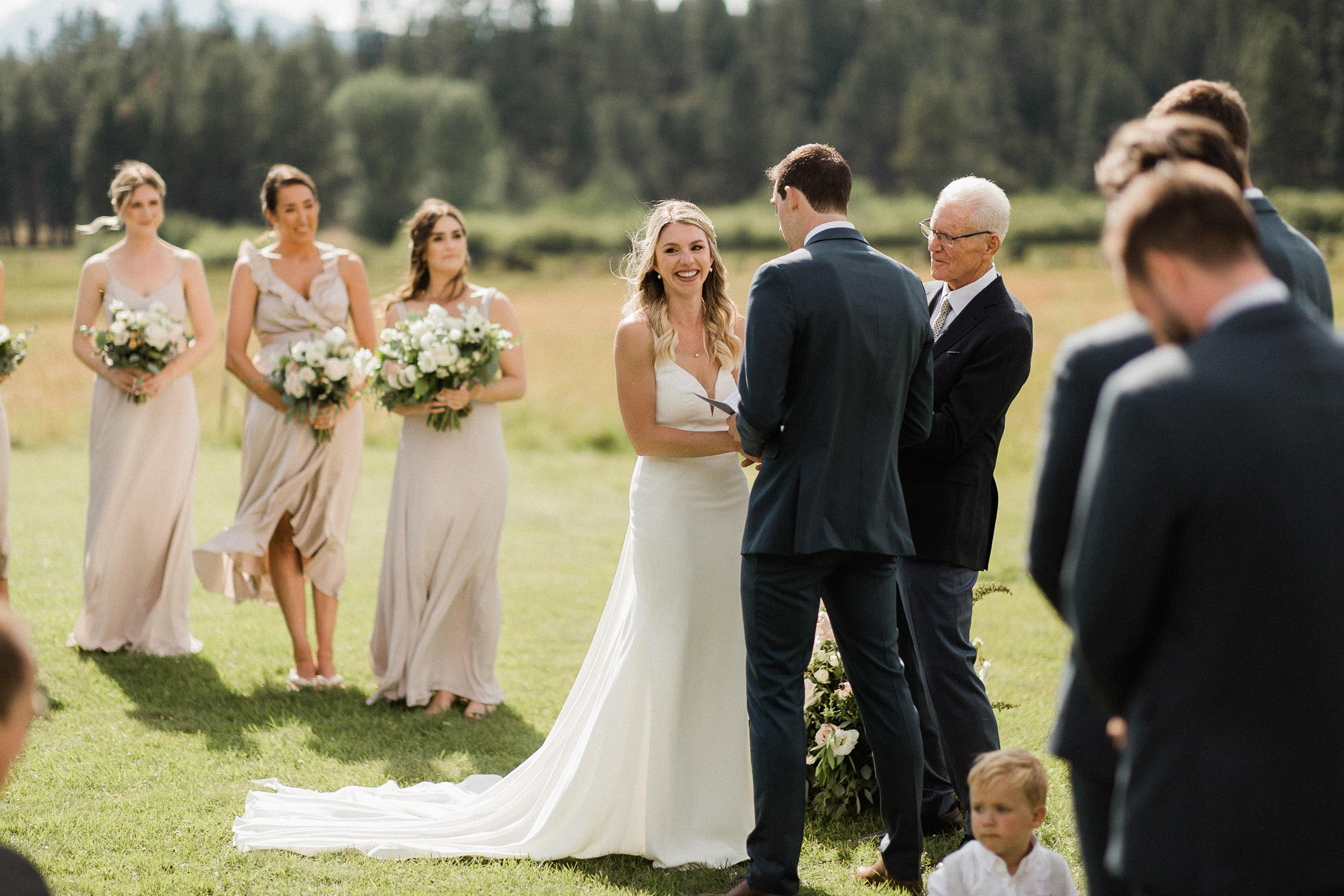 Bride smiles during wedding ceremony
