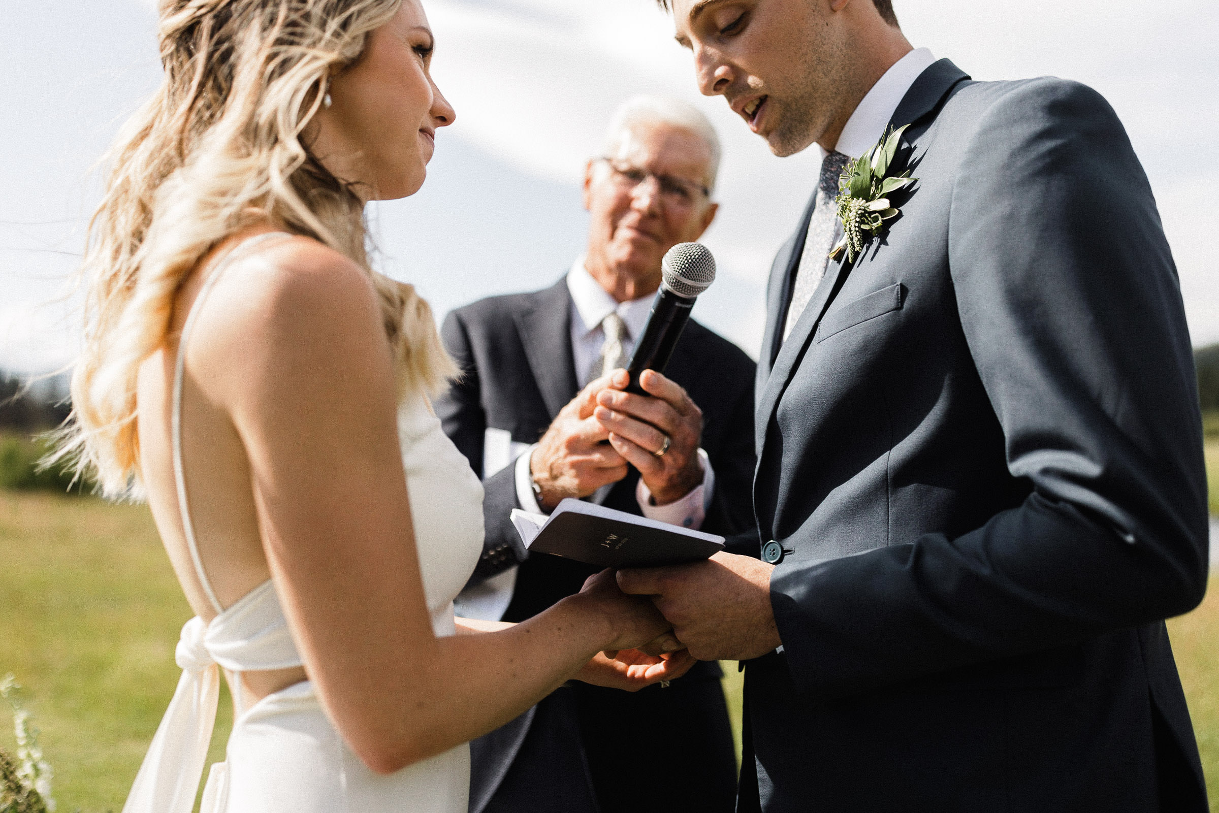Groom reads his vows during ceremony