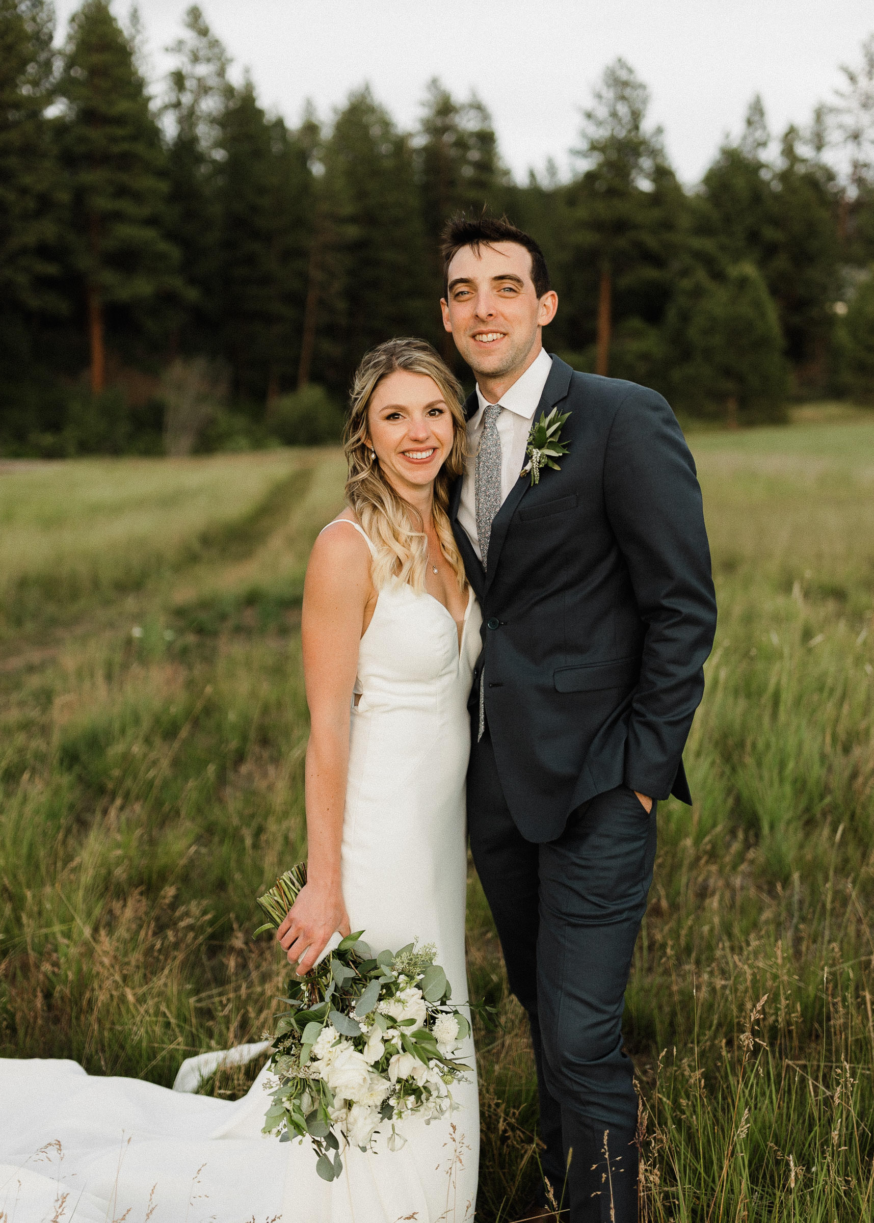 Bride and groom pose for a portrait
