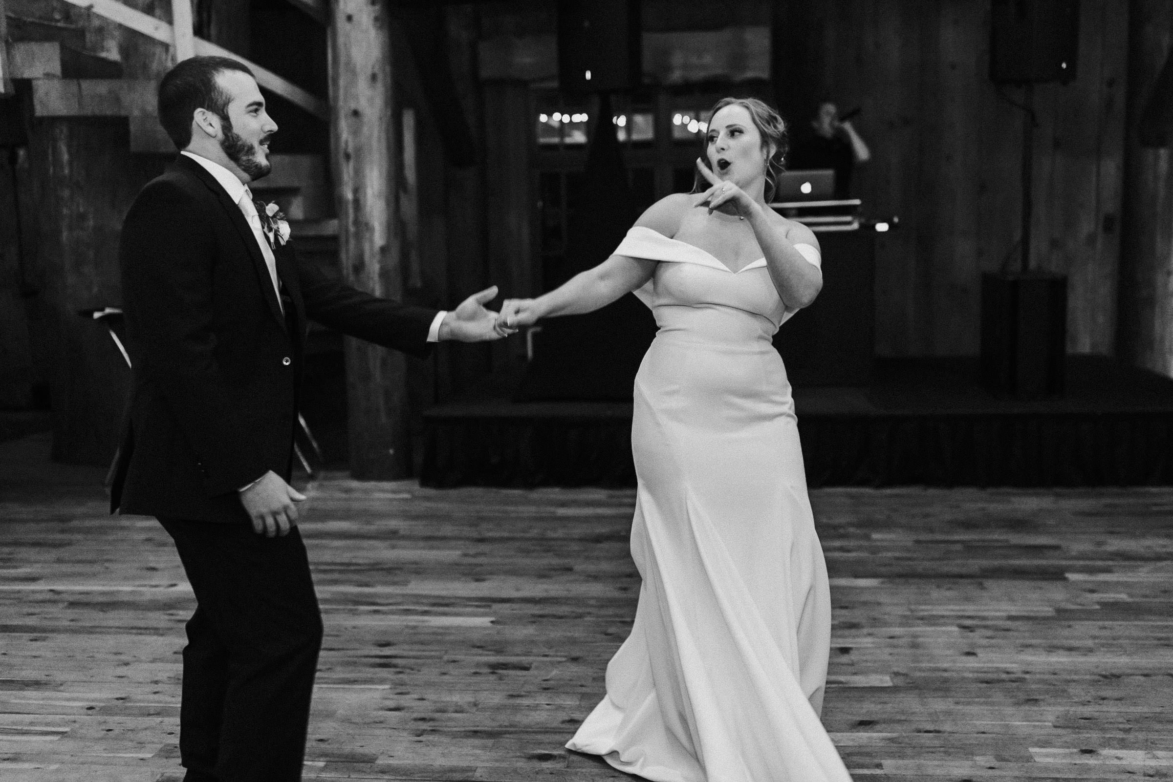 Bride and groom dance as they make their grand entrance to their wedding reception
