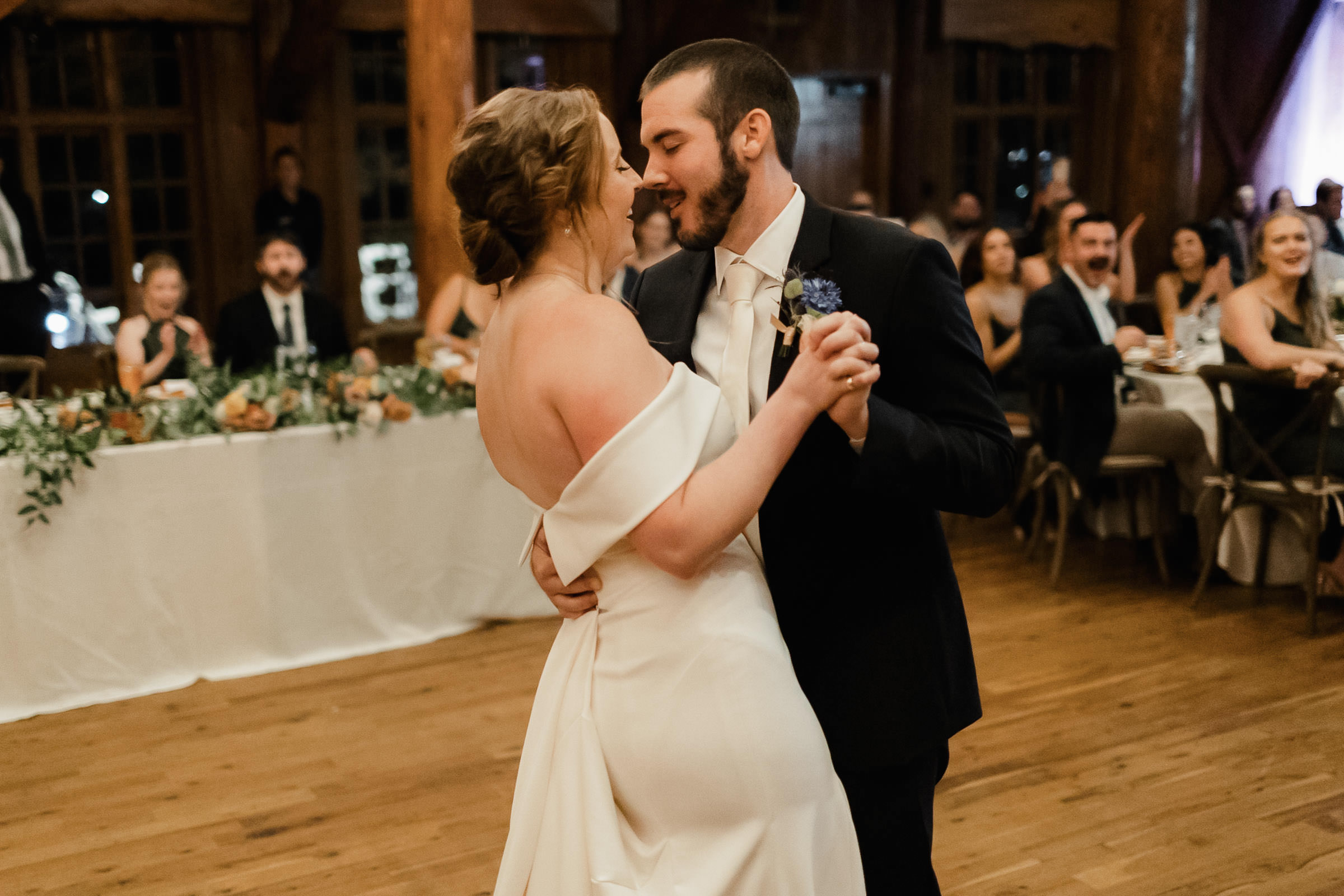 Bride and groom share their first dance at Sunriver Resort's Great Hall