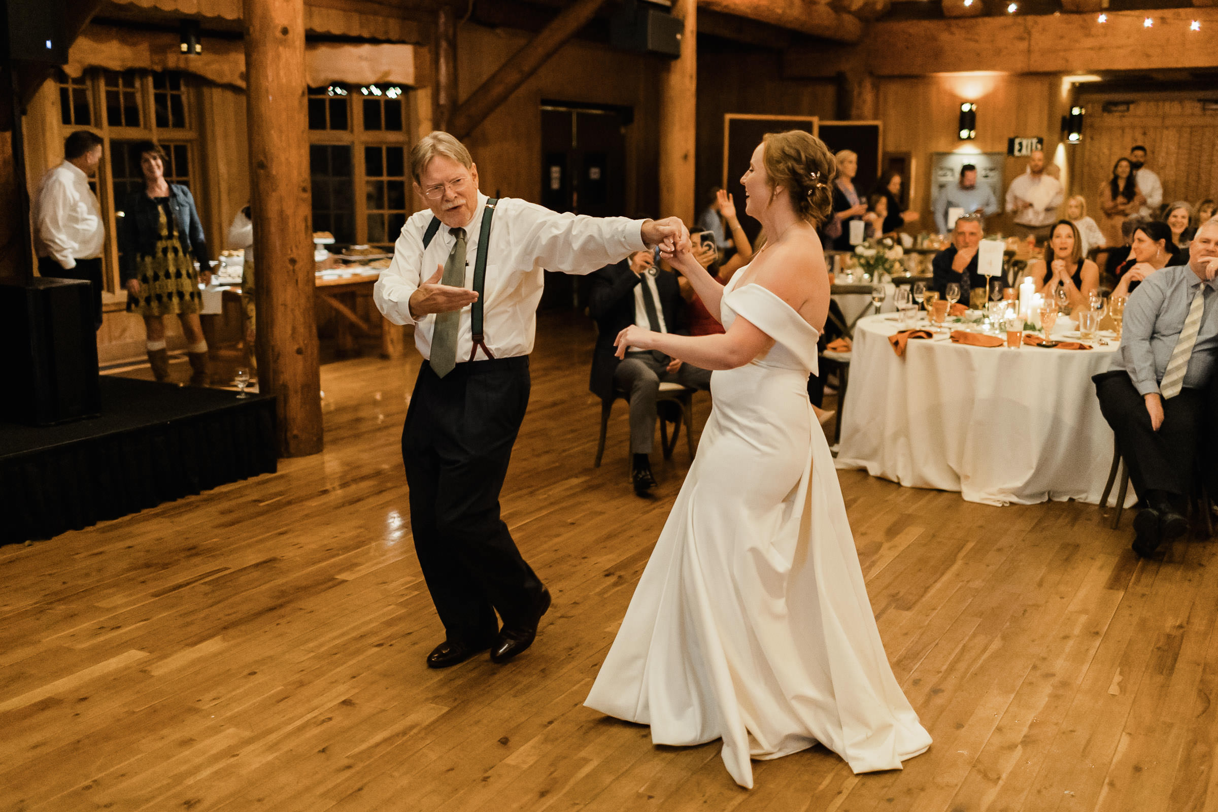 Bride and her dad dance together