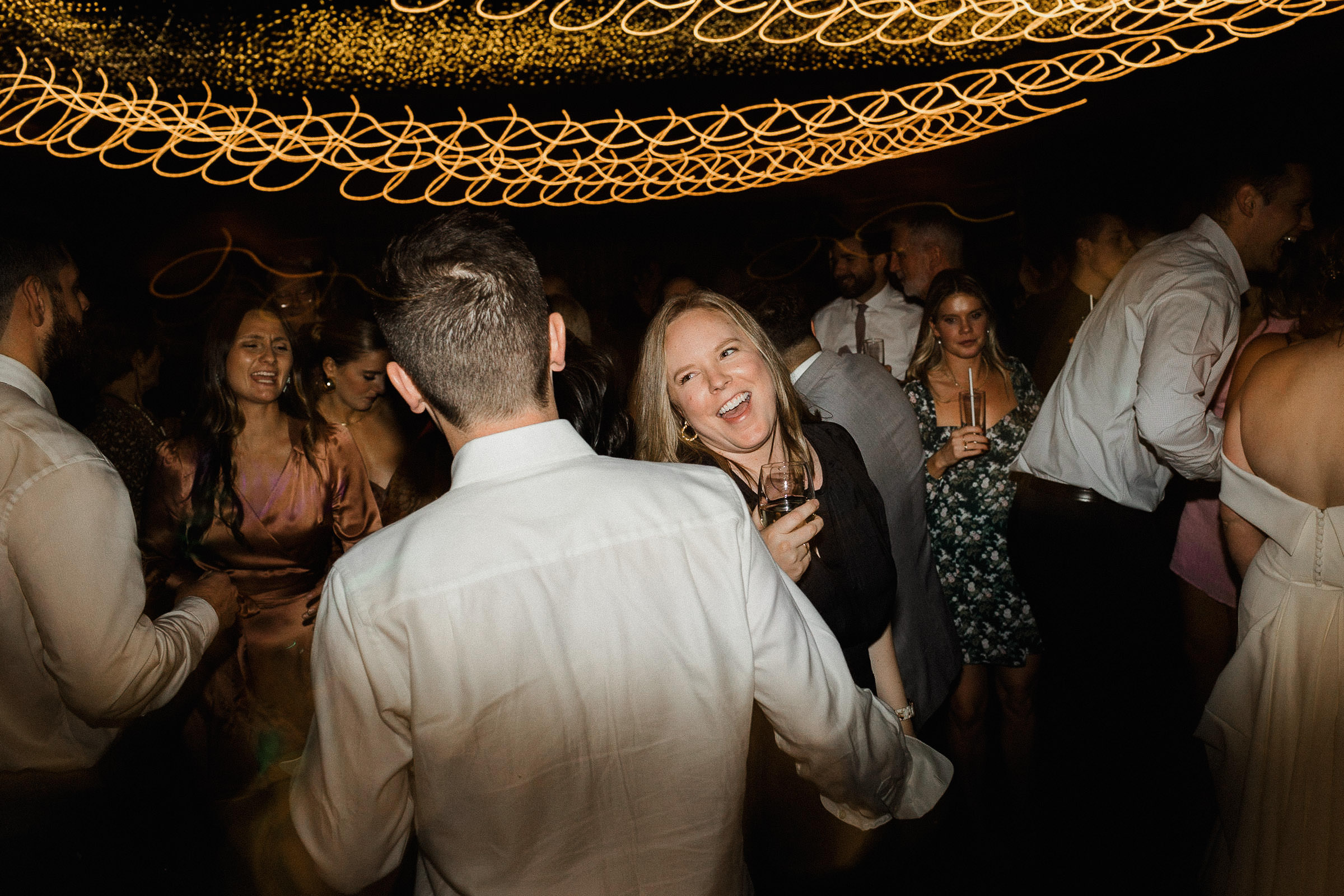 Guests dance on the dance floor
