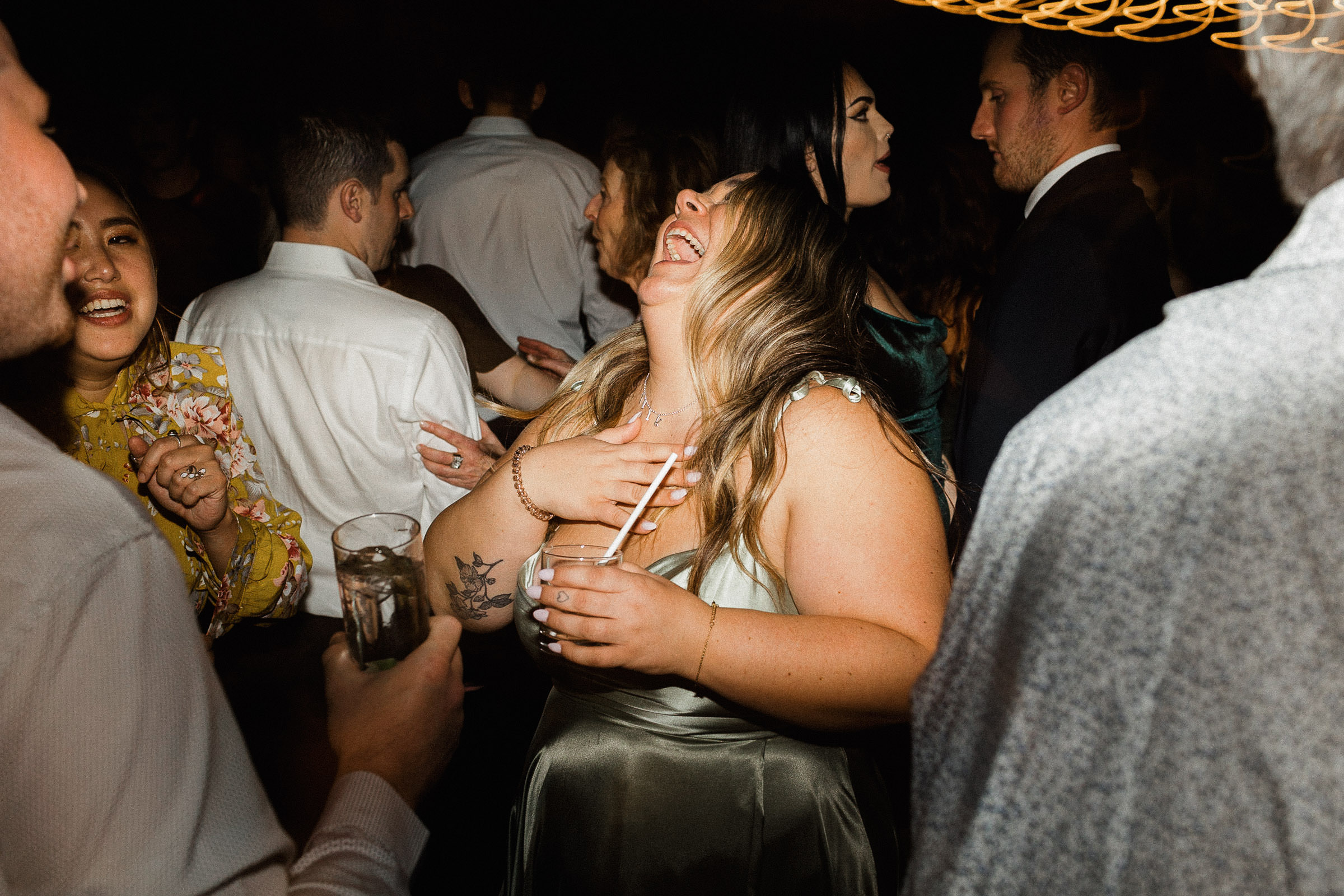 Guests dance on the dance floor